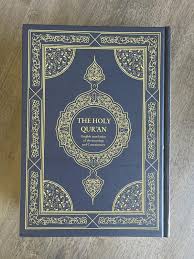 The Holy Qur-An: English translation of the meanings and commentary